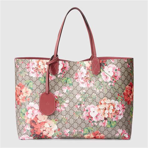 gucci gg blooms reversible tote|Gucci Bloom zip long wallet.